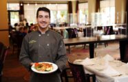 In-house culinary chef serving healthy meals and quality dining at Aljoya Thornton Place retirement community in Seattle.