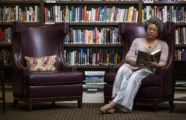 Woman reading in library