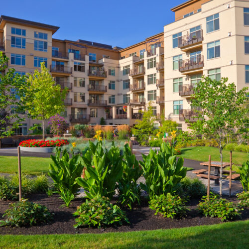 Exterior view of the Aljoya Mercer Island retirement community, offering comfortable senior living in a serene Mercer Island setting.