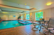 Swimming pool in fitness center at premium retirement living community