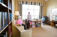 Residents gathering in the library seating area