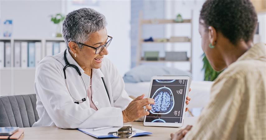 Doctor discussing brain health with patient.