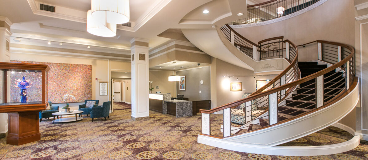 Interior wide-angle lobby shot of University House Wallingford Premier Retirement Living community.