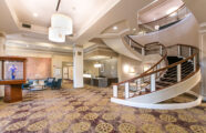 Interior wide-angle lobby shot of University House Wallingford Premier Retirement Living community.