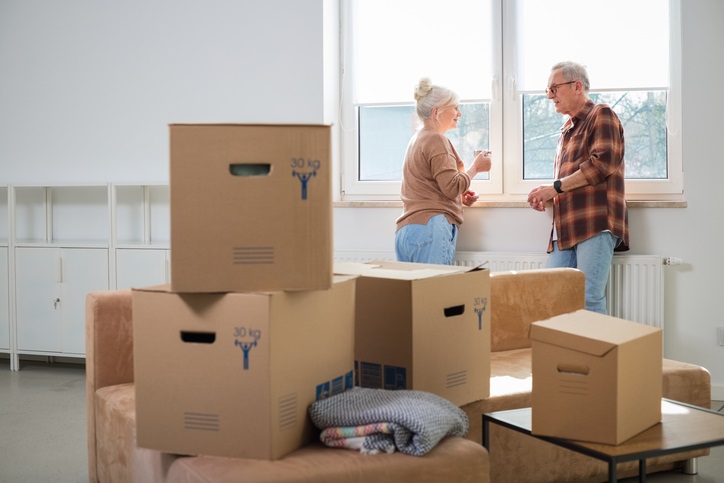 Older couple with moving boxes