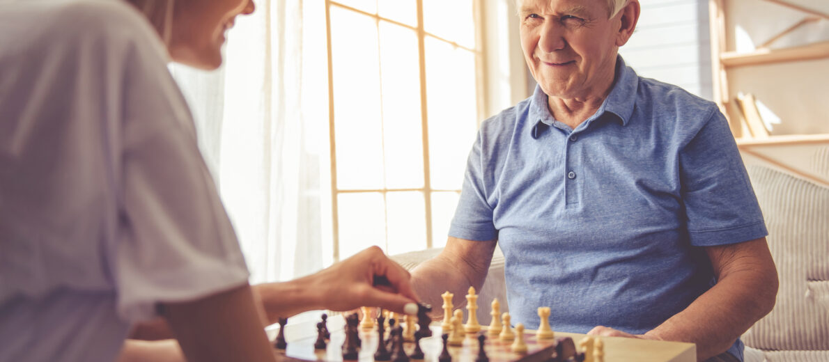 Senior gentleman playing chess